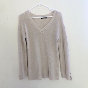 tan sweater